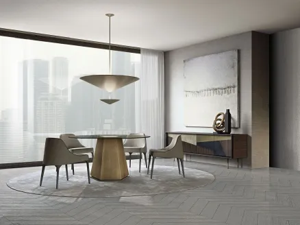 Jackie chair in upholstered fabric with solid wood legs by Frigerio.