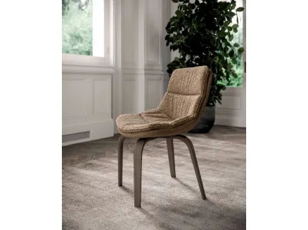 Selena upholstered chair in quilted fabric with wooden legs by Ozzio