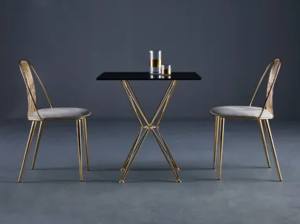 Waiya steel chair with padded seat by Colico.