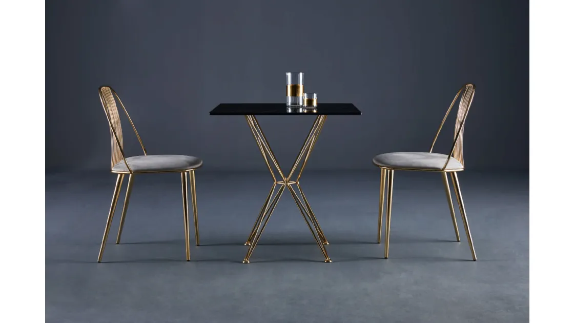 Waiya steel chair with padded seat by Colico.