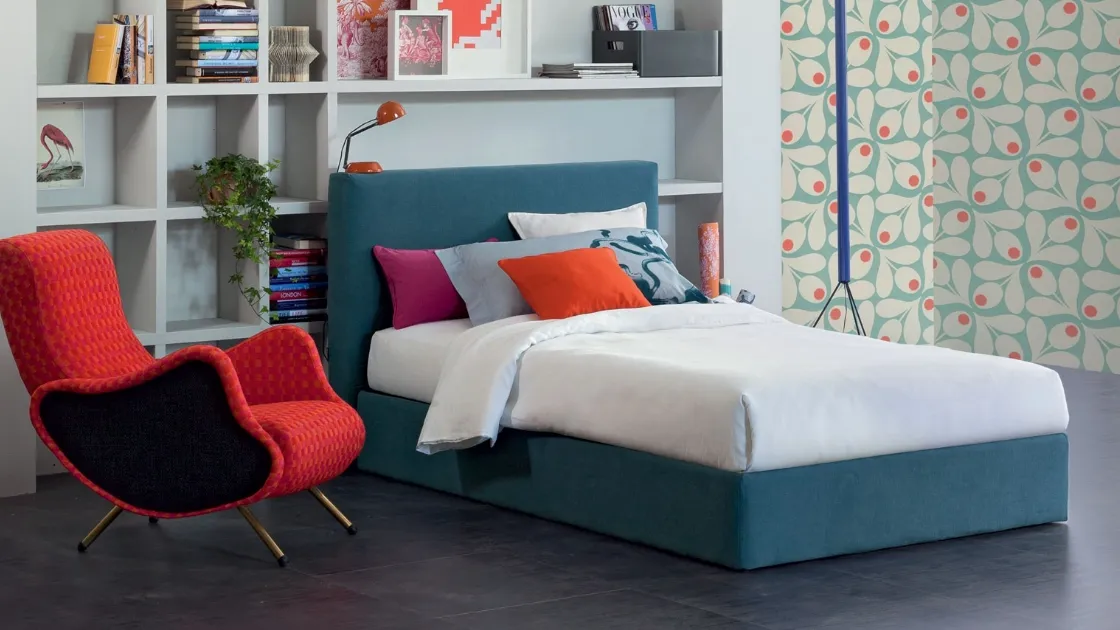 Single bed in fabric with Eclipse headboard by Oggioni.