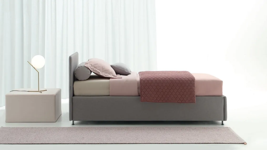 Single bed in fabric with Golf 503 headboard by Oggioni.