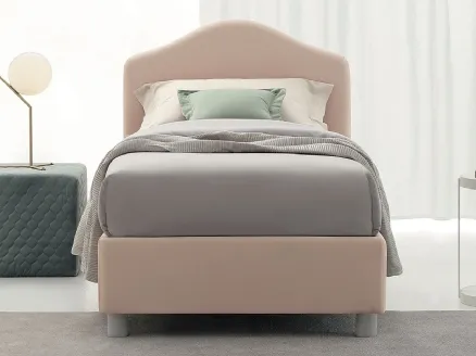 Single bed in Luxury fabric with shaped headboard by Oggioni.