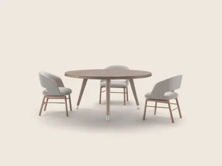 Round wooden Adler table by Flexform.