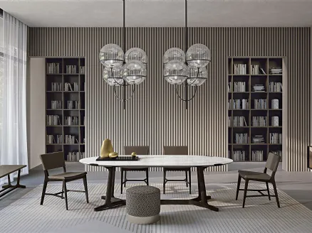 Oval table Arja in porcelain stoneware with solid wood base by Frigerio.