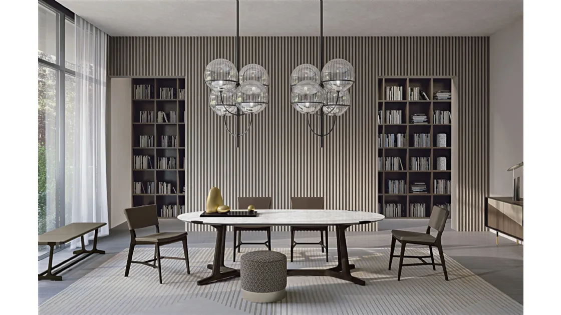 Oval table Arja in porcelain stoneware with solid wood base by Frigerio.