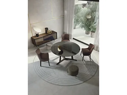 Round porcelain stoneware table with marble effect, with Arja solid wood base by Frigerio.