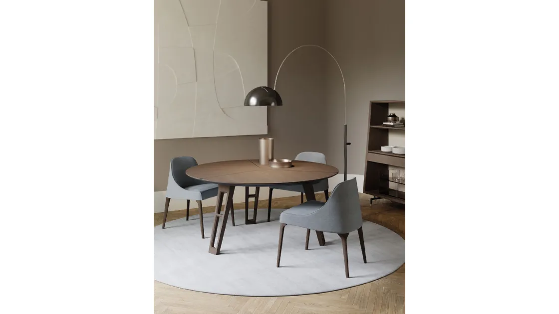 Round table with veneered wooden top and solid wood legs Axel by Frigerio.