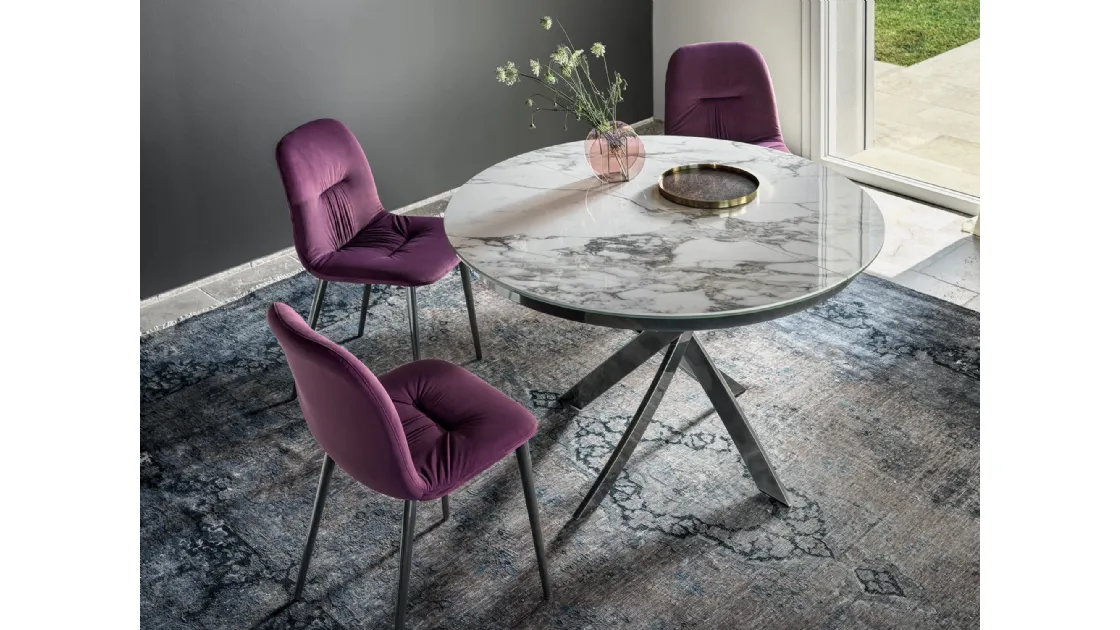 Round Barone table in SuperMarble by Bontempi.