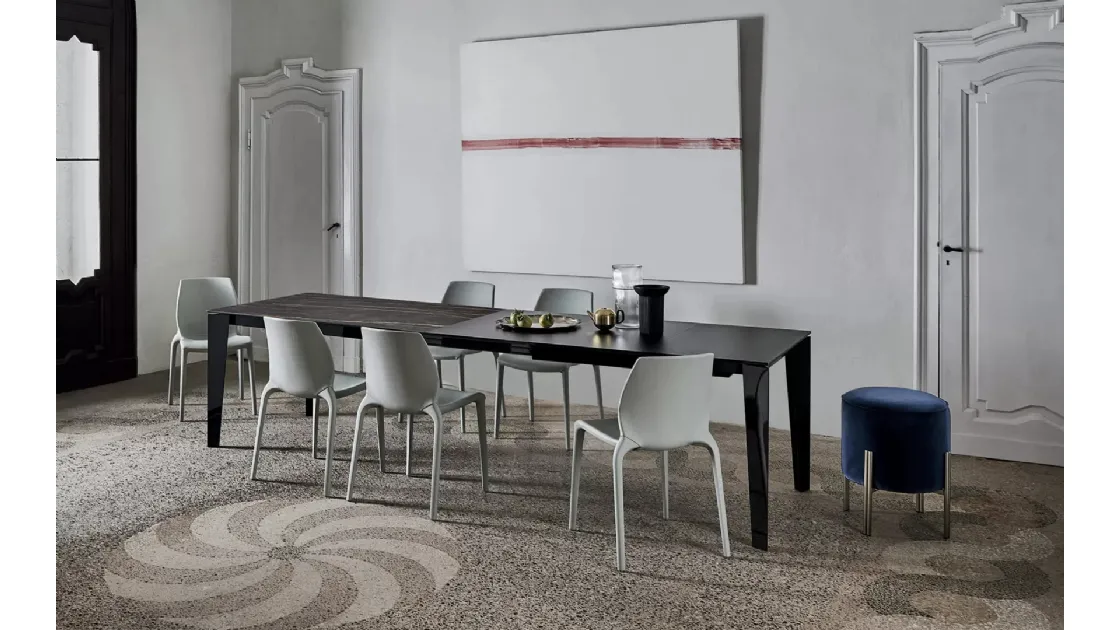 Extendable Cruz XXL table with SuperMarble top and lacquered steel base by Bontempi.