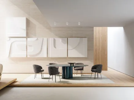 Round glossy lacquered table with a base formed by three Elly columns from Frigerio.