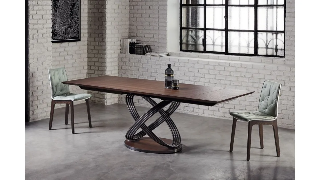 Fusion table with walnut veneer top by Bontempi.