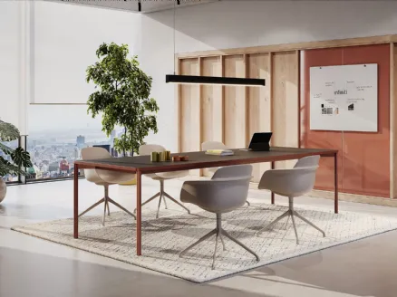 Foldable table with laminate top by Infiniti.