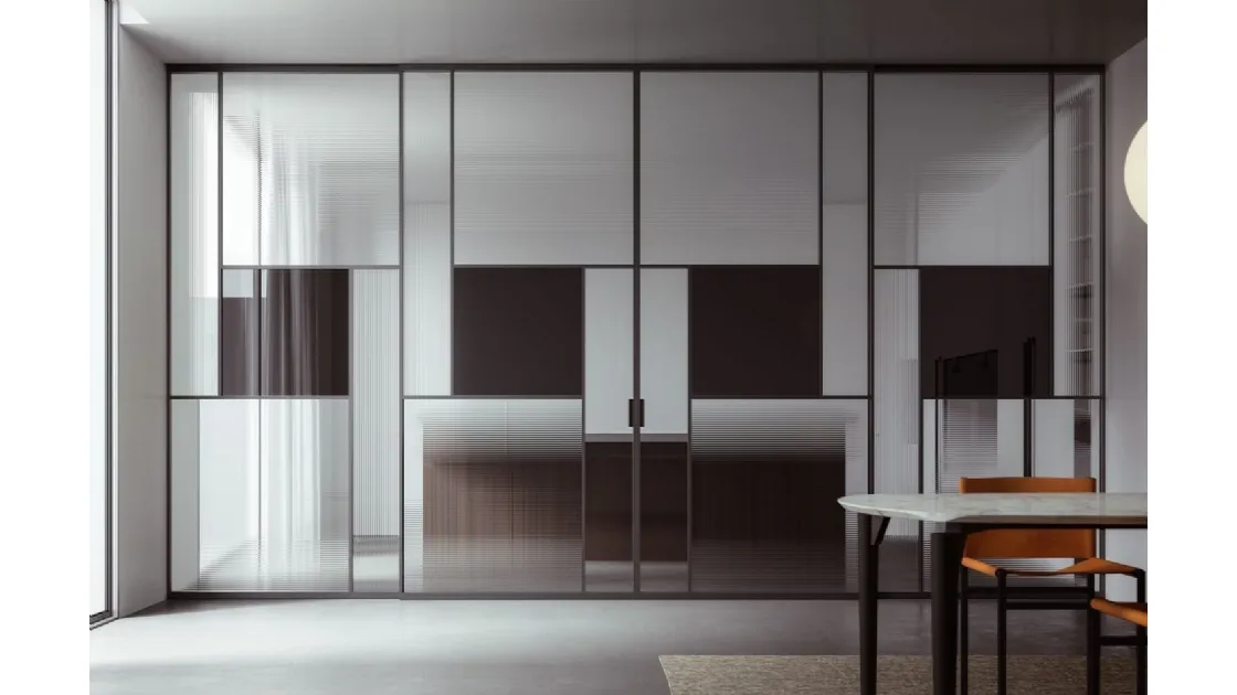 Sliding glass door for indoor use with aluminum frame and inserts Grande Officina by ADL.