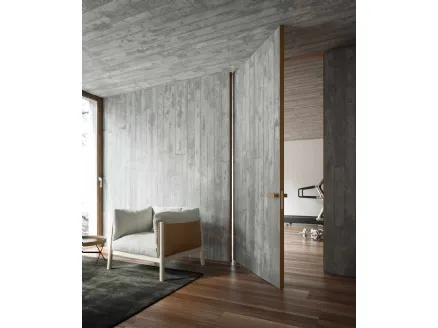 Swing door for interiors made of stoneware and Materica Filomuro stone by ADL.