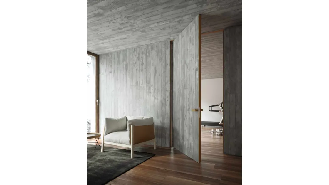 Swing door for interiors made of stoneware and Materica Filomuro stone by ADL.