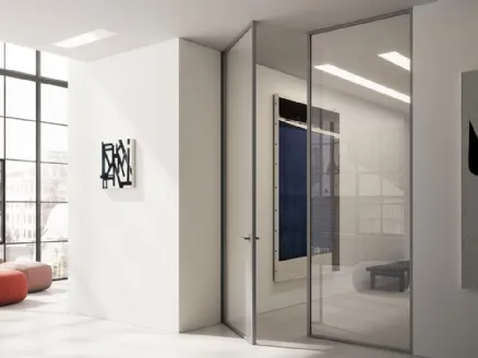 Interior Mythic swing door in glass with aluminum frame by ADL.