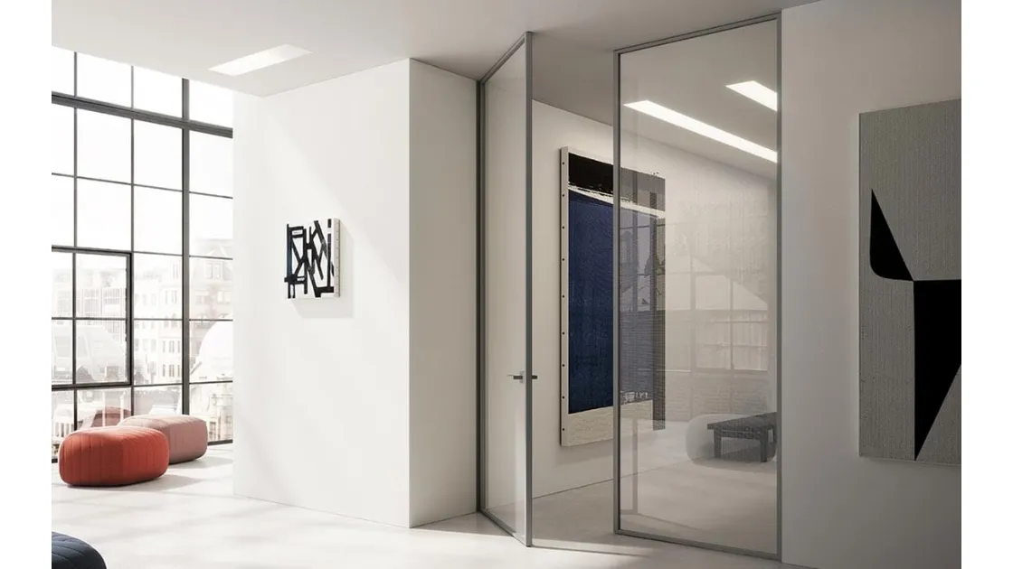 Interior Mythic swing door in glass with aluminum frame by ADL.