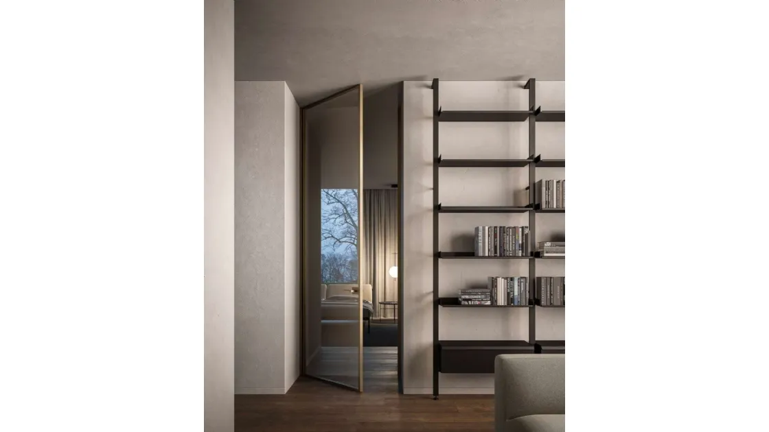 Mythical internal door with Bilico opening in glass and aluminum frame by ADL.