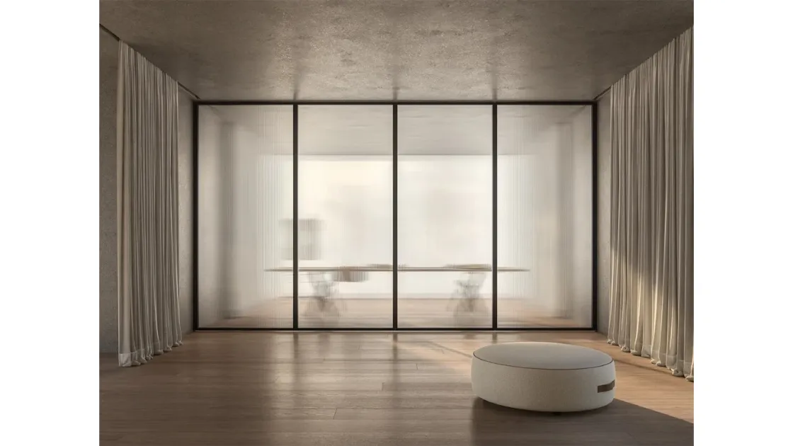 ADL's Mythical Sliding and Swiveling Glass Interior Door with Aluminum Frame.