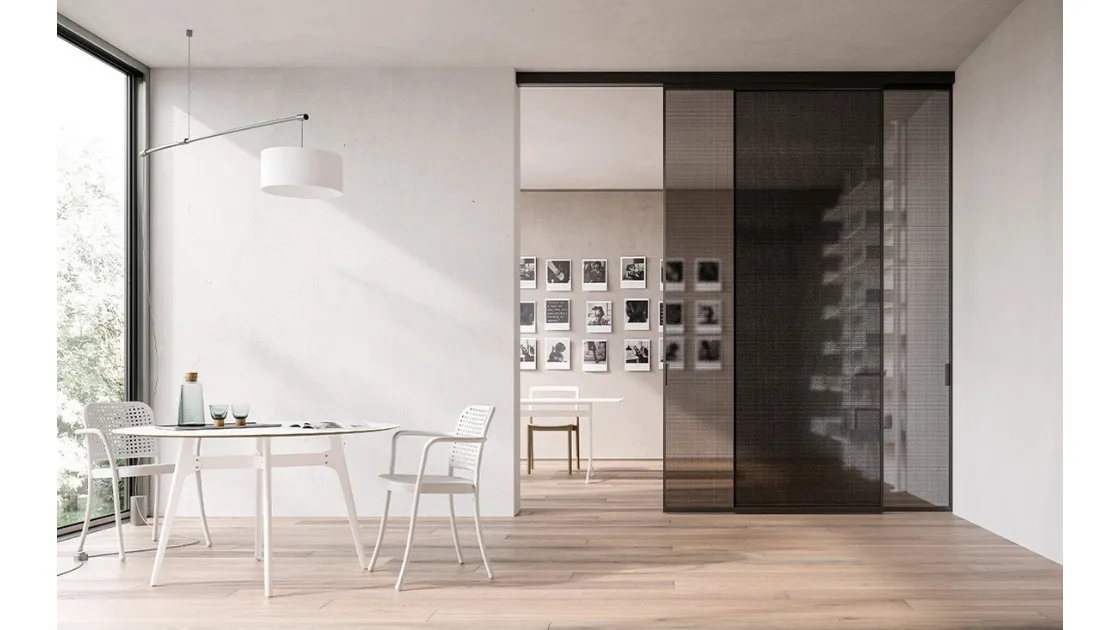 ADL's Mythic Sliding Glass Interior Door with Aluminum Frame.