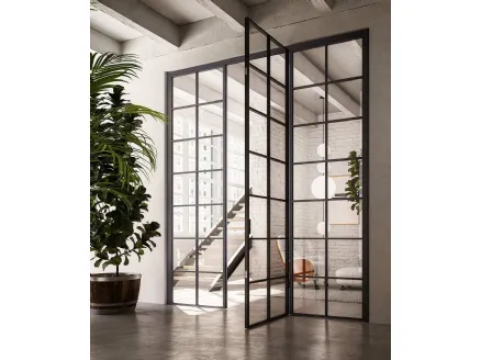 ADL's Officina hinged interior door made of glass and aluminum.