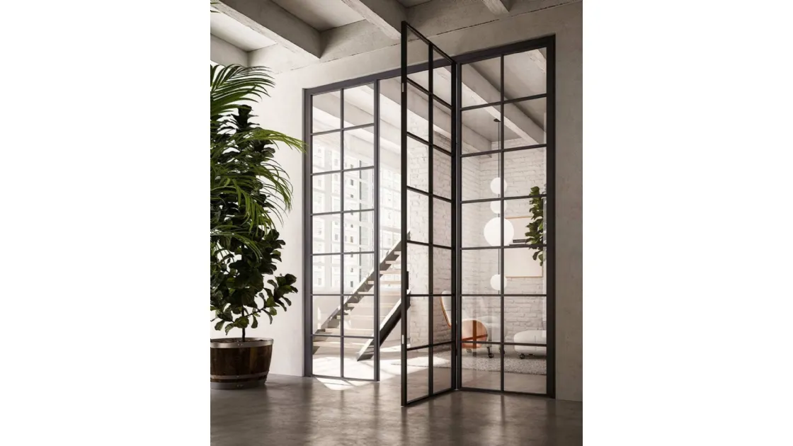 ADL's Officina hinged interior door made of glass and aluminum.