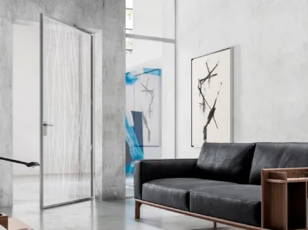Indoor glass door with Zeus aluminum frame by Doal.