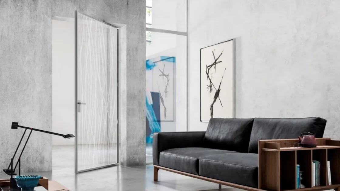 Indoor glass door with Zeus aluminum frame by Doal.