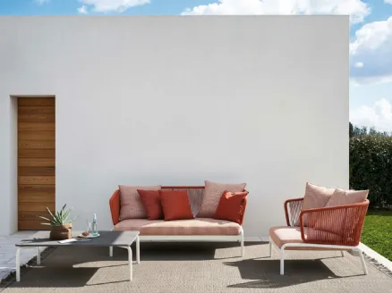 Outdoor furniture in fabric with stone Spool table by Roda.